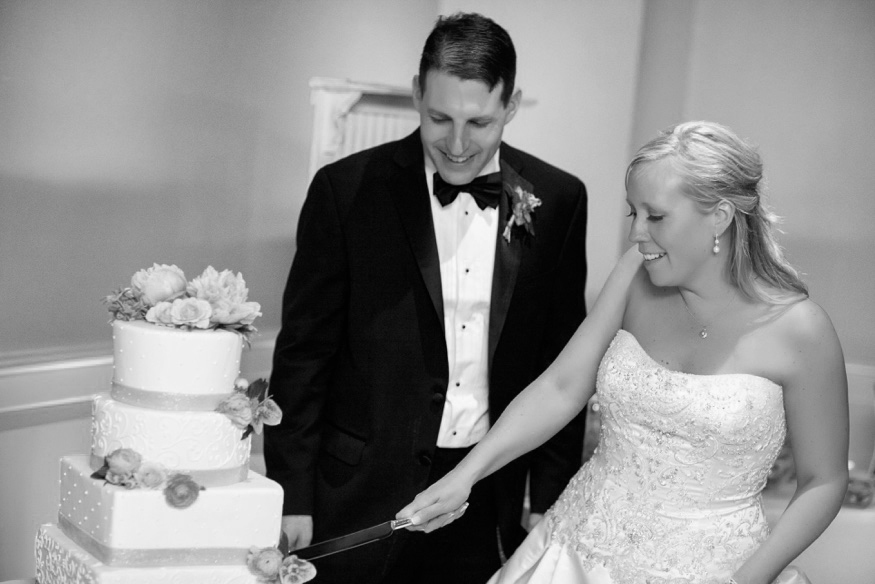 Cake cutting at Olde Bar Philadelphia wedding.